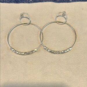 Elegant Silver Hoop Earrings with movable beads